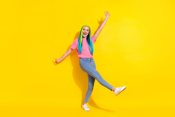 Fototapeta na wymiar Full length body size view of attractive cheerful funny girl dancing having fun isolated over bright color background