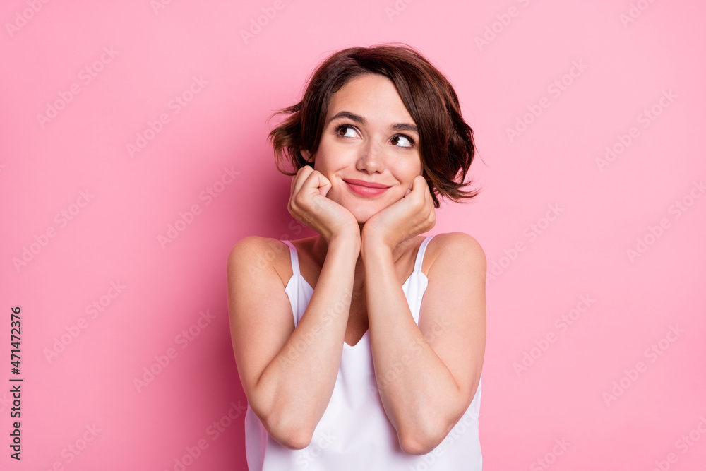 Sticker portrait of attractive cheery feminine girl creating solution isolated over pastel pink color backgr