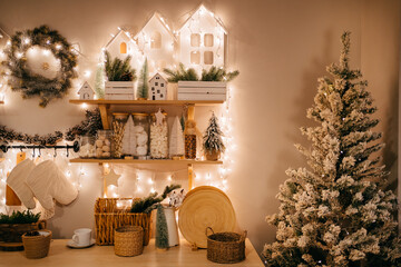 Christmas decor. garlands on shelves on decorated in kitchen for new year. 