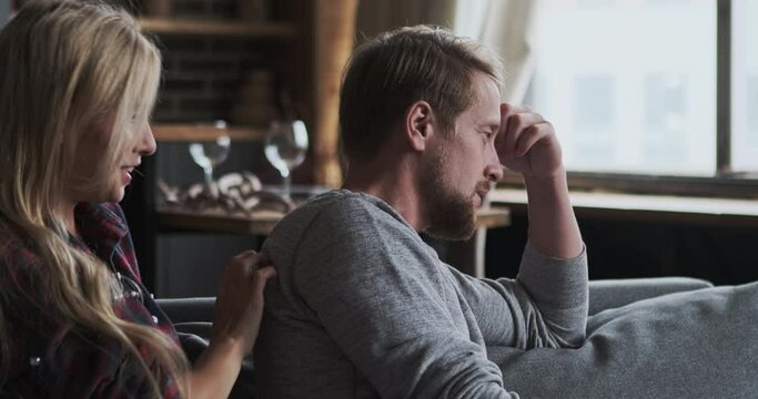 Husband resentment to wife having family conflict relationship problem talking discuss trouble at home apartment. Marriage couple communicating woman regret feeling guilty support assist and console