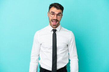Business caucasian man isolated on blue background with surprise facial expression