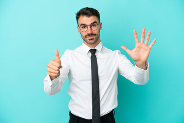 Business caucasian man isolated on blue background counting six with fingers