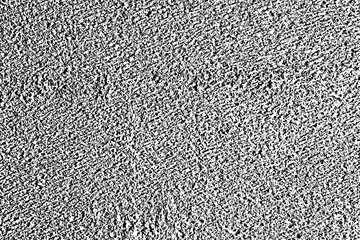 Grunge texture of a rough concrete surface with fine grains of sand, grains, random dots, particles. Abstract urban background. Vector illustration. Overlay template.