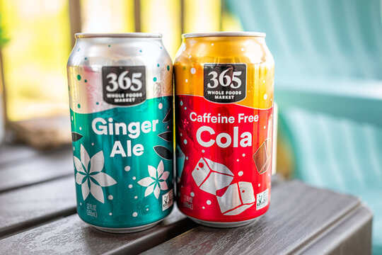 Sugar Mountain, USA - May 31, 2021: Closeup Of Two Aluminum Cans For Whole Foods 365 Brand Soda Cola And Ginger Ale Flavors With Label Sign For Caffeine Free