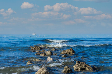 sea ​​shore, beach, rocks and small waves. No People. Copy Space. Selective Focus.