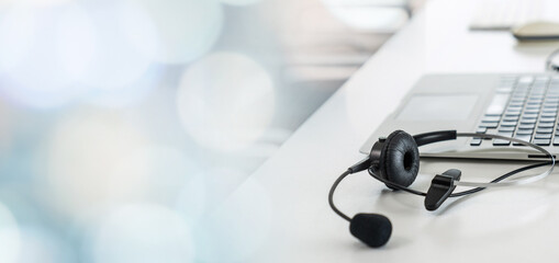 Headset and customer support equipment at call center ready for actively service . Corporate...