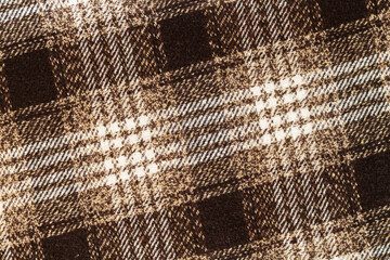 Brown checkered wool or tweed textile background