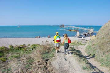 Punta Aderci Nature Reserve - Abruzzo -  A couple looking for a free beach to relax by the sea,...