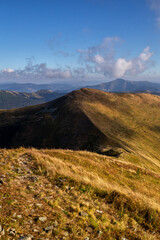 Beautiful autumn mountains in the Carpathians. A walk in the mountains in sunny weather.
