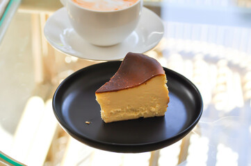 tea or hot tea or milk tea, Thai milk tea and basque burnt cheesecake or basque cheese cake
