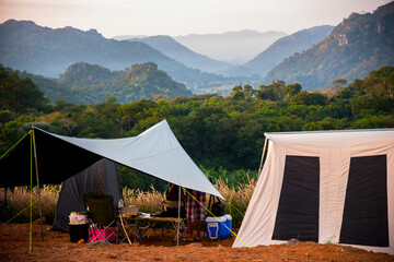 Camping tent with mountain background in holiday