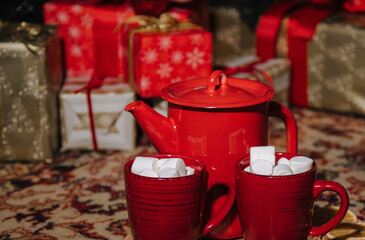 red teapot and cups in Christmas style