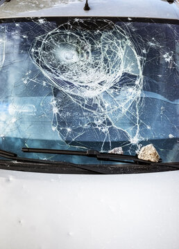 Car glass shattered by a stone