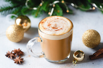 Cappuccino with cinnamon hot Christmas drink. Festive New Year holidays drink