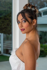 Fototapeta na wymiar Girl with wedding dress posing for photo shoot