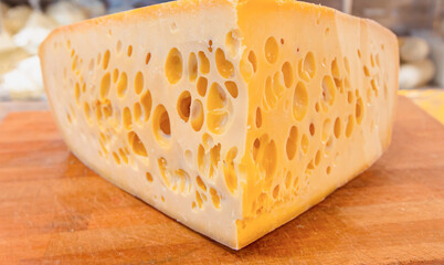 Traditional Old Sliced Turkish Kars cheddar cheese - Close-uo yellow gruyere cheese 