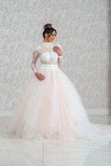 Fototapeta na wymiar Girl with wedding dress posing for photo shoot