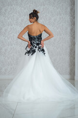 Fototapeta premium Girl with wedding dress posing for photo shoot