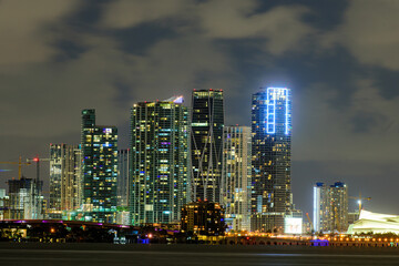 Fototapeta na wymiar Miami business district, lights and reflections of the city lights. Miami night downtown.