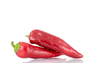 Two red sweet peppers, close-up, isolated on white.