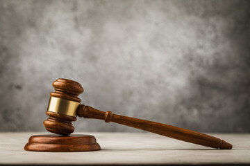 Wooden judge gavel or for auction on an abstract background with copy space