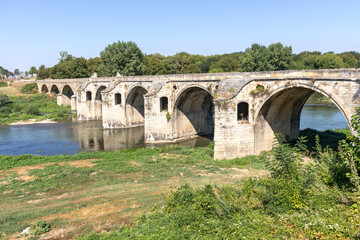 Fototapeta na wymiar Nineteenth-century bridge over the Yantra River in Byala, Bulgaria