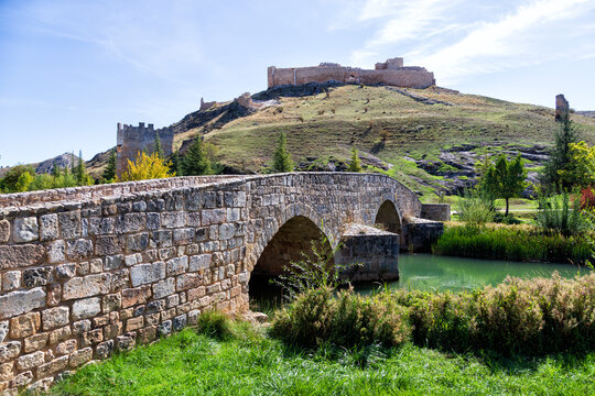 Osma bridge and castle in Burgo de Osma, Soria. Castilla y Leon, Sppain