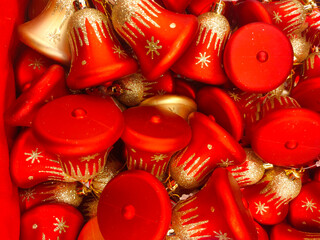 Christmas tree colorful red and gold shiny bells close-up