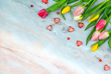 Tulips on a marble surface. Floral background with copy space for placing text for the design of...