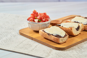 Traditional Mexican breakfast of molletes served.