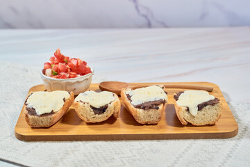 Authentic homemade Mexican molletes on your plate.