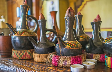Ethiopian jebena coffee pots on the bar counter, Kyiv, Ukraine