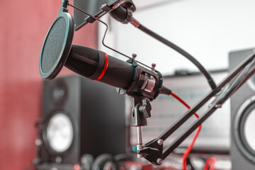 Obraz premium Pop filter microphone records audio during a podcast. Sound recording studio