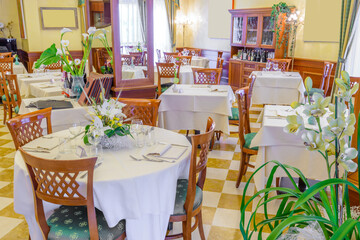Fototapeta na wymiar Classic dining room in luxury restaurant, hotel.