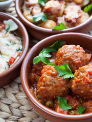 Albondigas - Spanish cuisine traditional homemade meatballs in rich tomato sauce.