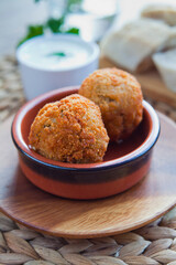 Mushroom croquette with  potatoes, stewed wild mushrooms, cream and garlic gravy filing.