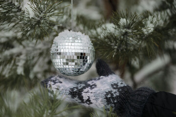 silver christmas ball on christmas tree