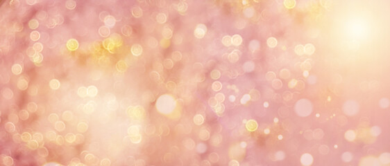 Defocused glitter peach bokeh background. Festive christmas abstract background with yellow lights