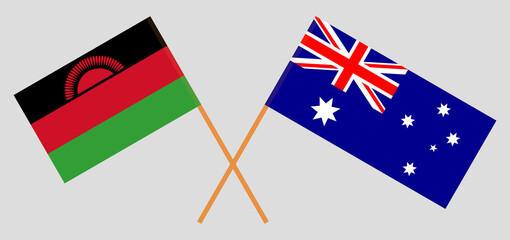Crossed flags of Malawi and Australia. Official colors. Correct proportion