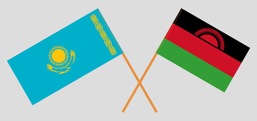 Crossed flags of Kazakhstan and Malawi. Official colors. Correct proportion