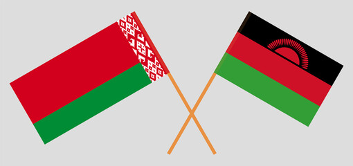 Crossed flags of Belarus and Malawi. Official colors. Correct proportion