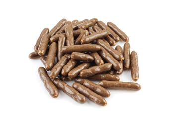 Pile of small wafer sticks covered with chocolate and isolated on white background