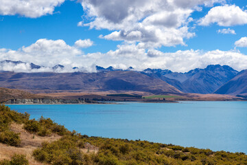 Naklejka na ściany i meble Scenic view of colourful Lake Tekapo in New Zealand