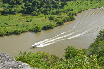 Boat floating on the river.