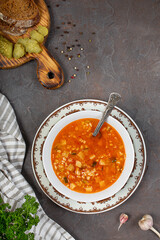 traditional Russian soup rassolnik with pickled cucumber