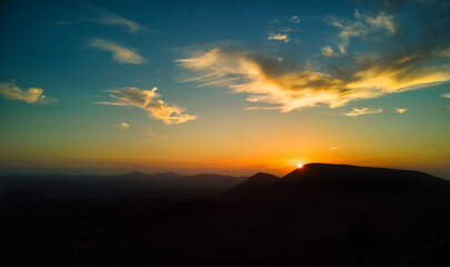 Fototapeta na wymiar Stunning panoramic view of sunset over Caldron Hondo Fuerteventura canary island Spain 