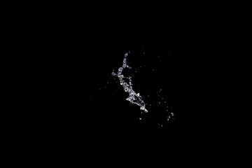 Water splash isolated on black background.