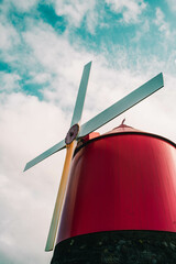 Red windmill and blue sky