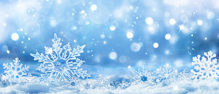 Snowflakes On Snow - Christmas And Winter Background - Natural Snowdrift Close Up With Abstract Light