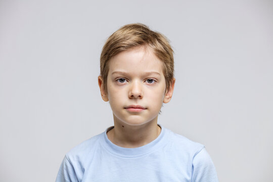Portrait of cute young boy looking at camera